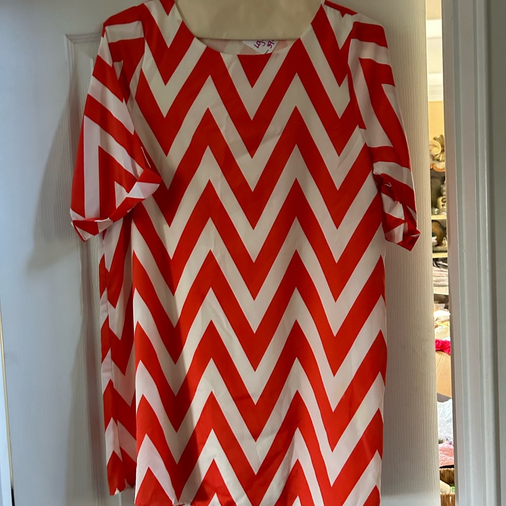 Orange and white blouse/tunic.